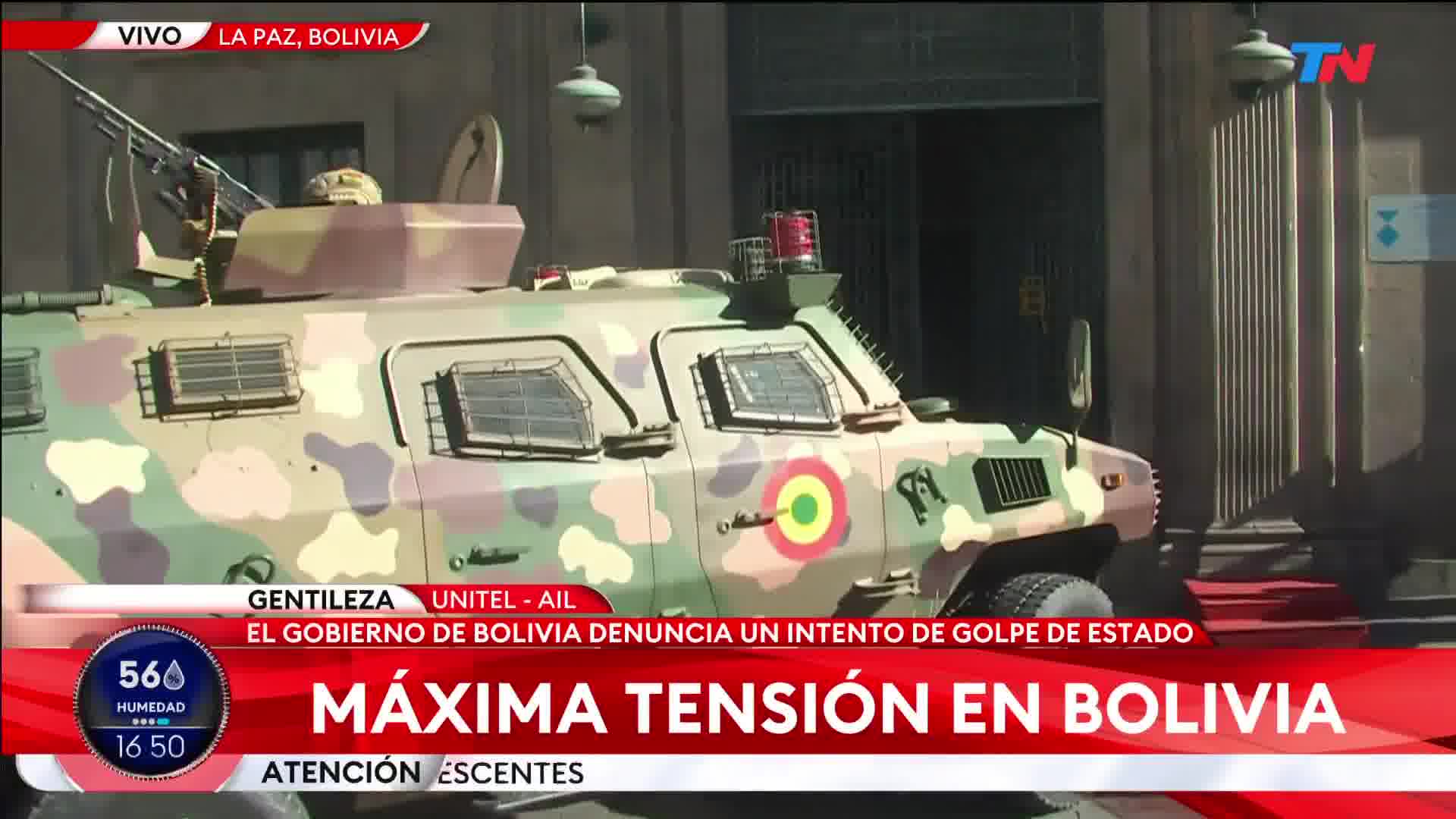 Bolivian military armoured vehicle breaks down the doors of the Palacio Quemado (former presidential residence) in La Paz and soldiers enter to secure the building
