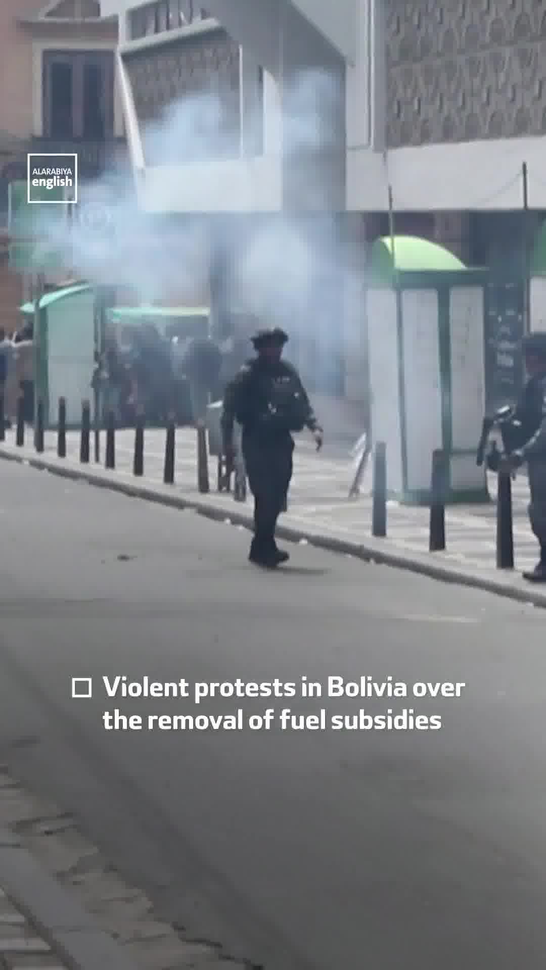 Violent protests in Bolivia over the removal of fuel subsidies leave at least four police officers injured. Footage shows clashes between protesters and security forces following the elimination of state fuel subsidies