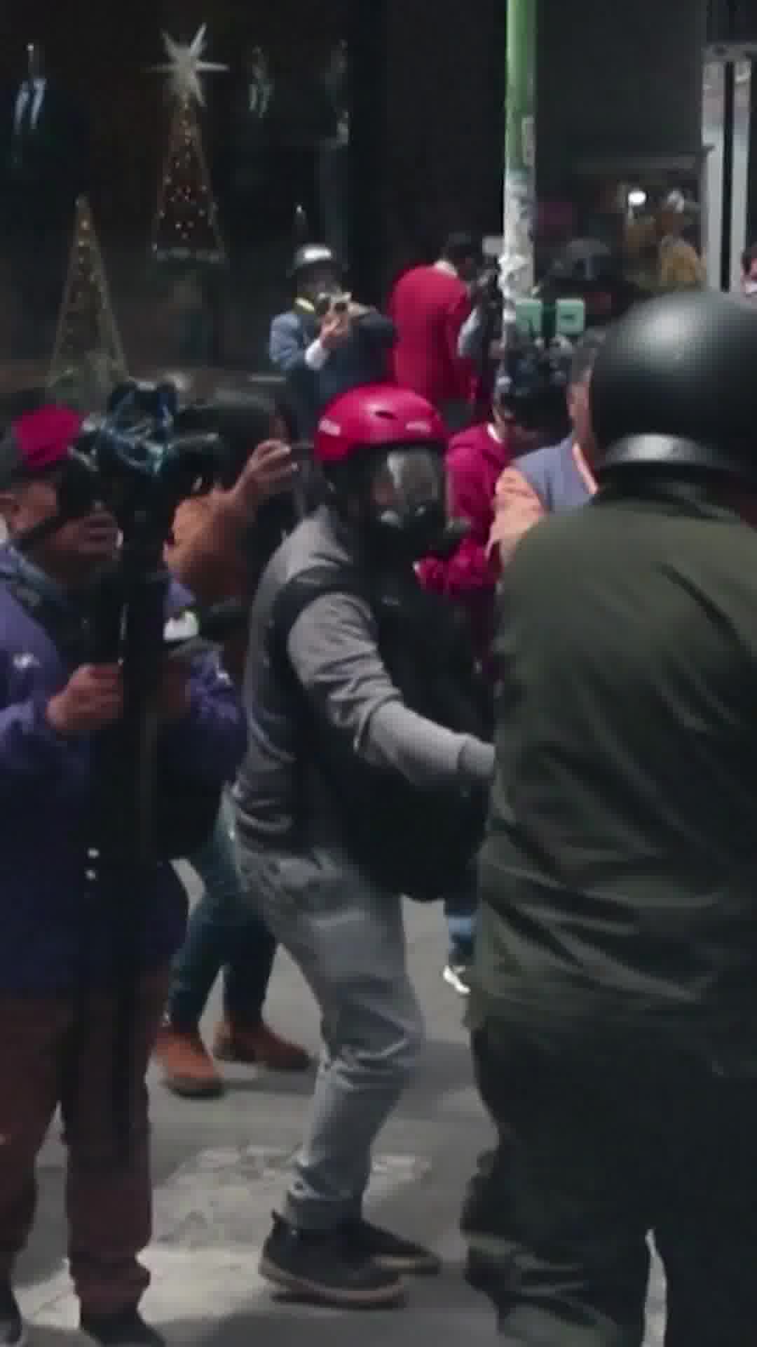 Violent protests in Bolivia over the removal of fuel subsidies leave at least four police officers injured. Footage shows clashes between protesters and security forces following the elimination of state fuel subsidies